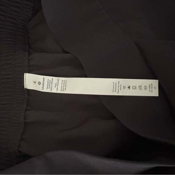 LULULEMON sz 4 With The Flow Black Pants Wrap Front Travel Woven - Picture 7 of 7